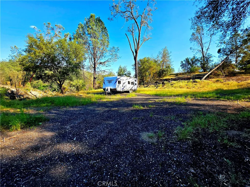 1 River Knolls Road Coarsegold, CA 93614 - Photo 4 of 14 a view of a golf course with a house
