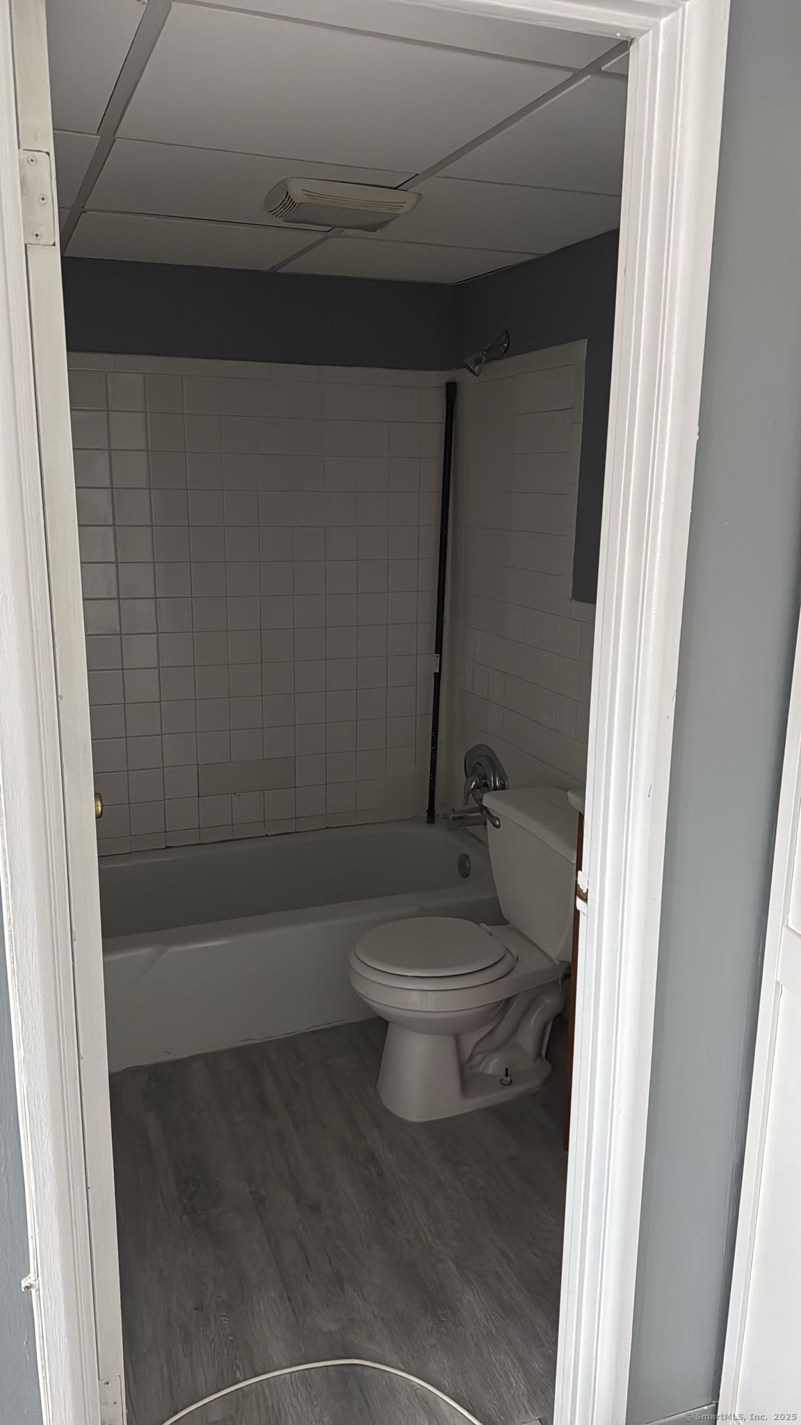 191 Oak Street, Unit B6 Bridgeport, CT 06604 - Photo 13 of 15 a bathroom with a toilet and a shower