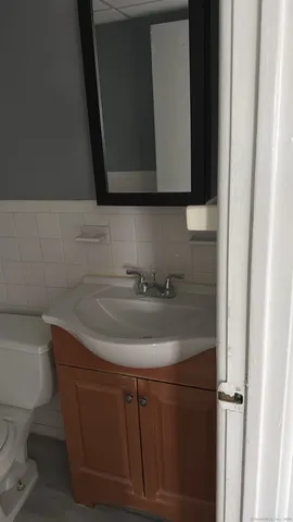 a wall with a painting on it