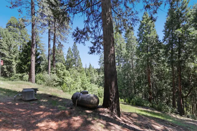 a view of balcony with wooden floor and outdoor seating