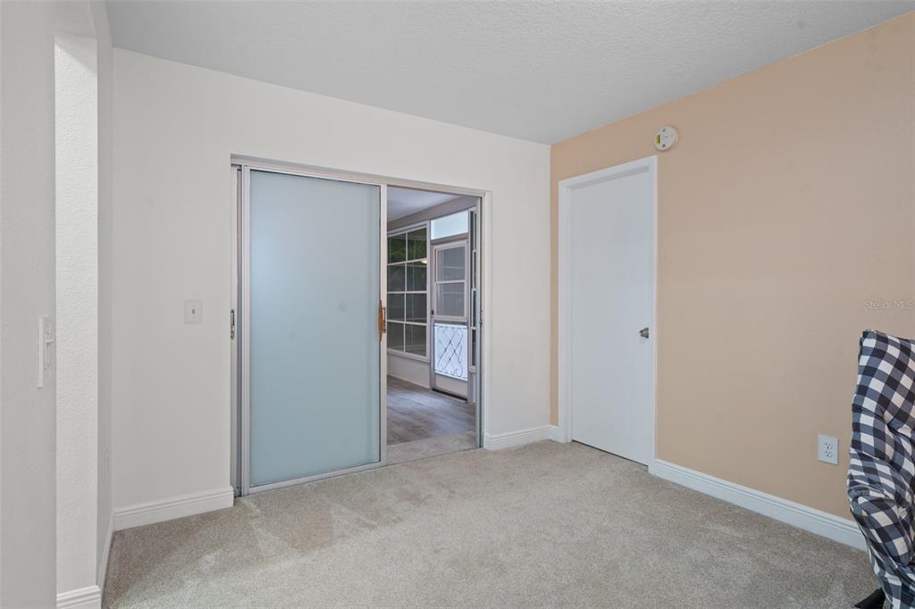 8130 Merrimac Drive Port Richey, FL 34668 - Photo 12 of 53 a view of an empty room with a closet