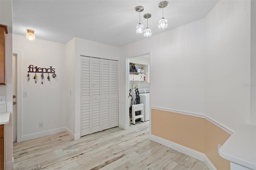 8130 Merrimac Drive Port Richey, FL 34668 - Photo 18 of 53 wooden floor in an empty room