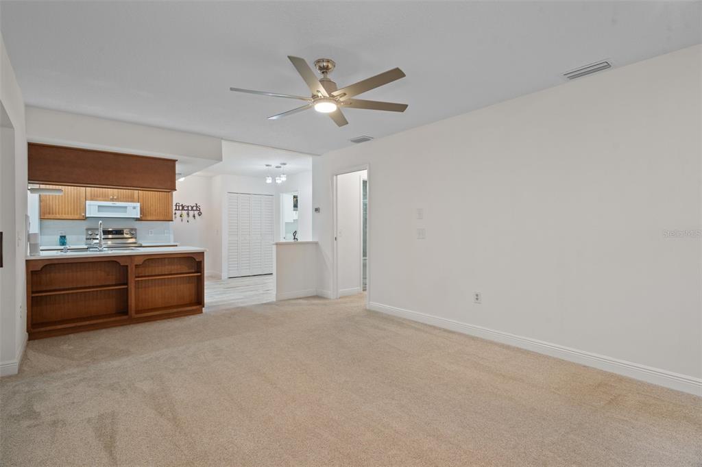 8130 Merrimac Drive Port Richey, FL 34668 - Photo 21 of 53 a view of kitchen with refrigerator and window