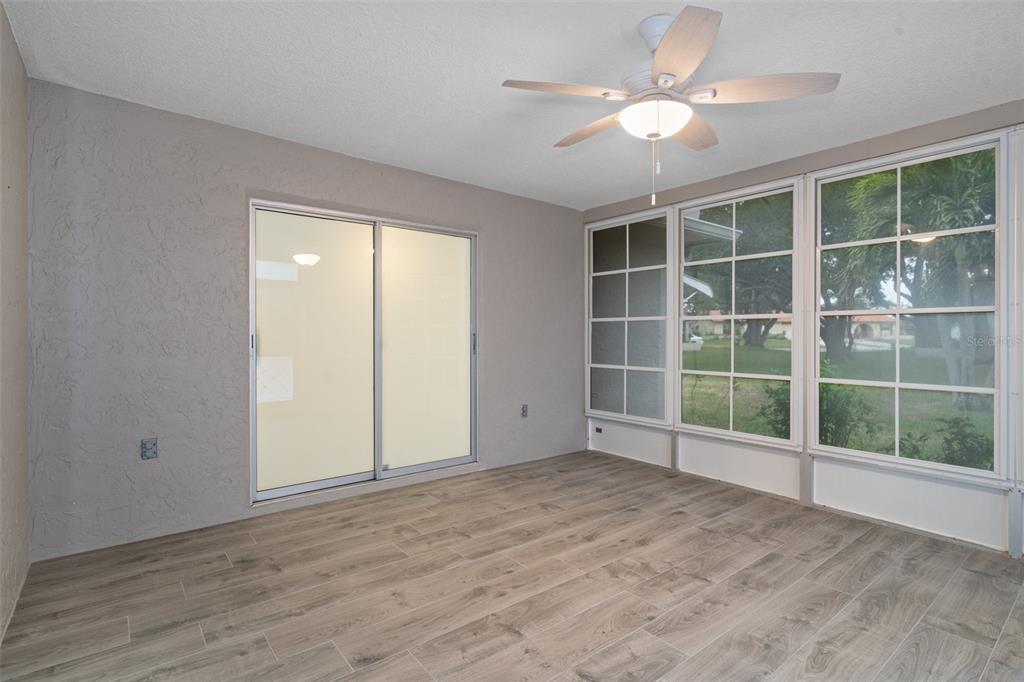 8130 Merrimac Drive Port Richey, FL 34668 - Photo 35 of 53 a view of an empty room with a window