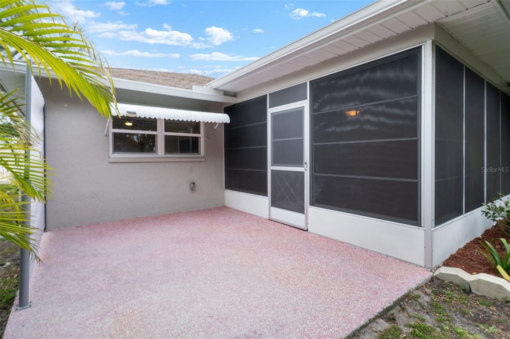 8130 Merrimac Drive Port Richey, FL 34668 - Photo 39 of 53 a view of an empty room with a windows and fireplace