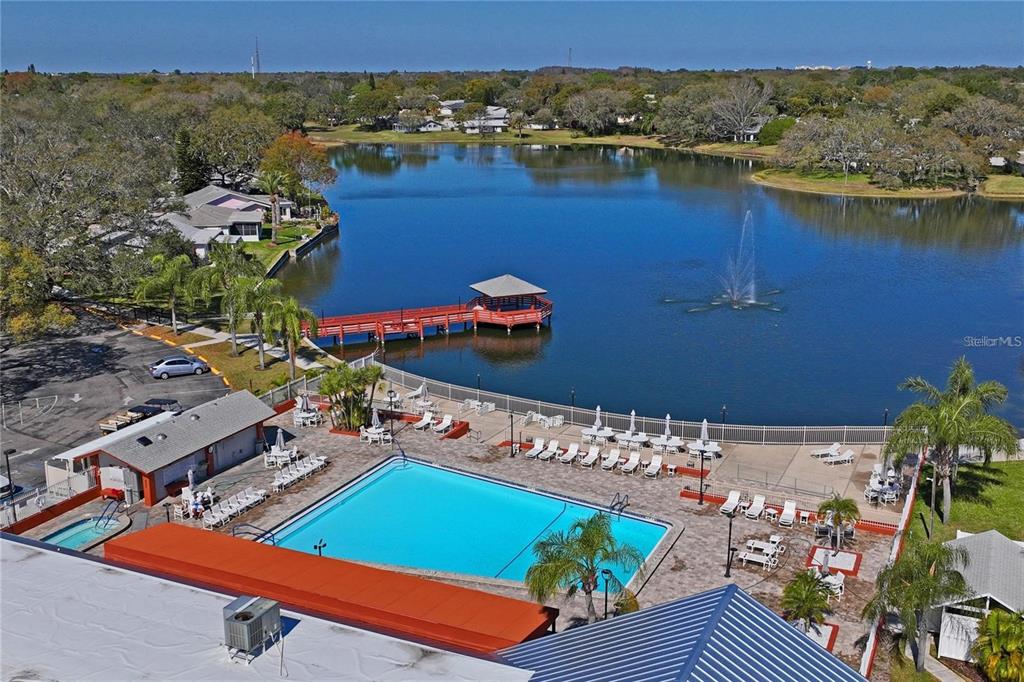8130 Merrimac Drive Port Richey, FL 34668 - Photo 51 of 53 an aerial view of a house with a lake view