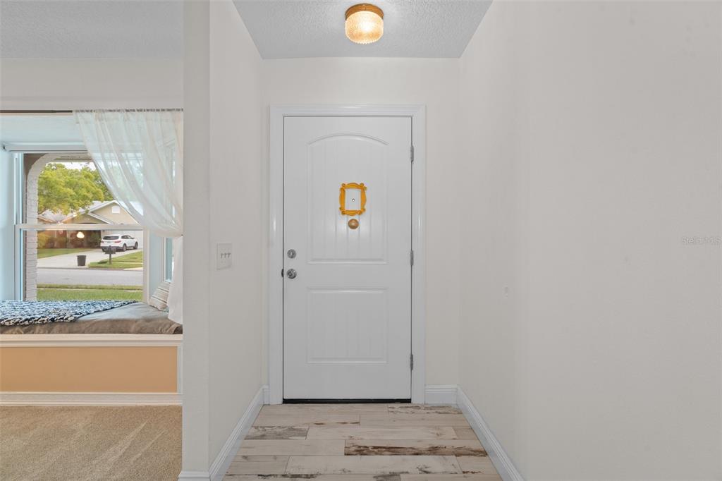 8130 Merrimac Drive Port Richey, FL 34668 - Photo 6 of 53 a view of an entryway