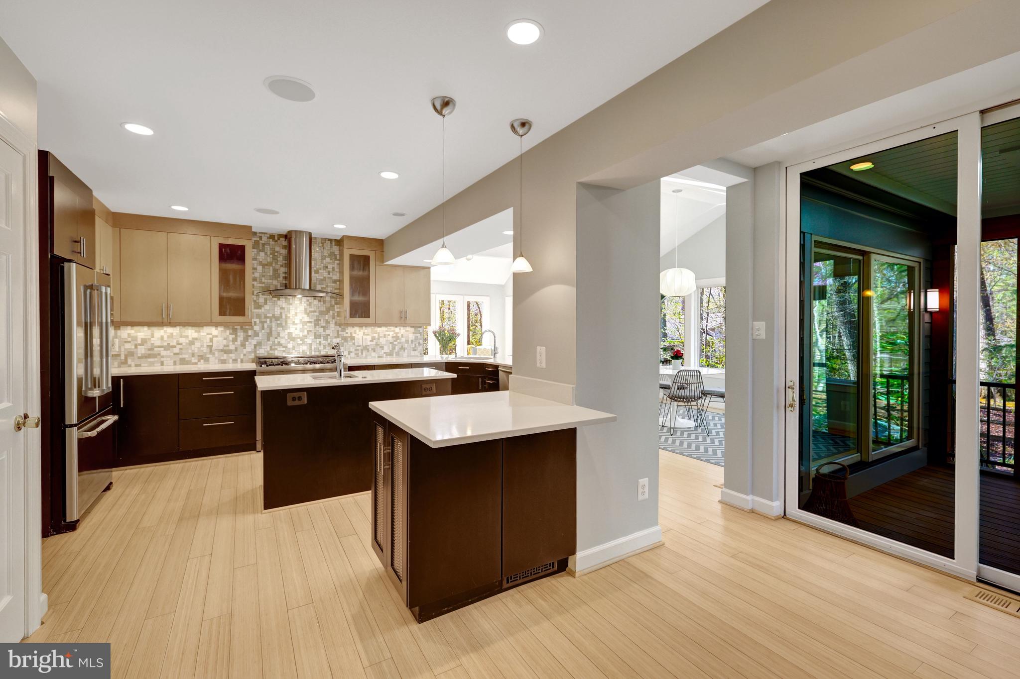 11809 State Rte 4707 Reston, VA 20191 - Photo 26 of 70 There are 2 sliding glass doors to the porch.