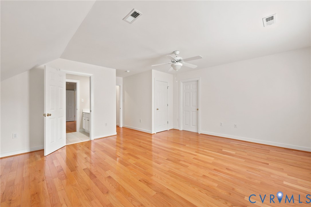 4701 Regal Oaks Road Glen Allen, VA 23059 - Photo 35 of 60 a view of an empty room with wooden floor