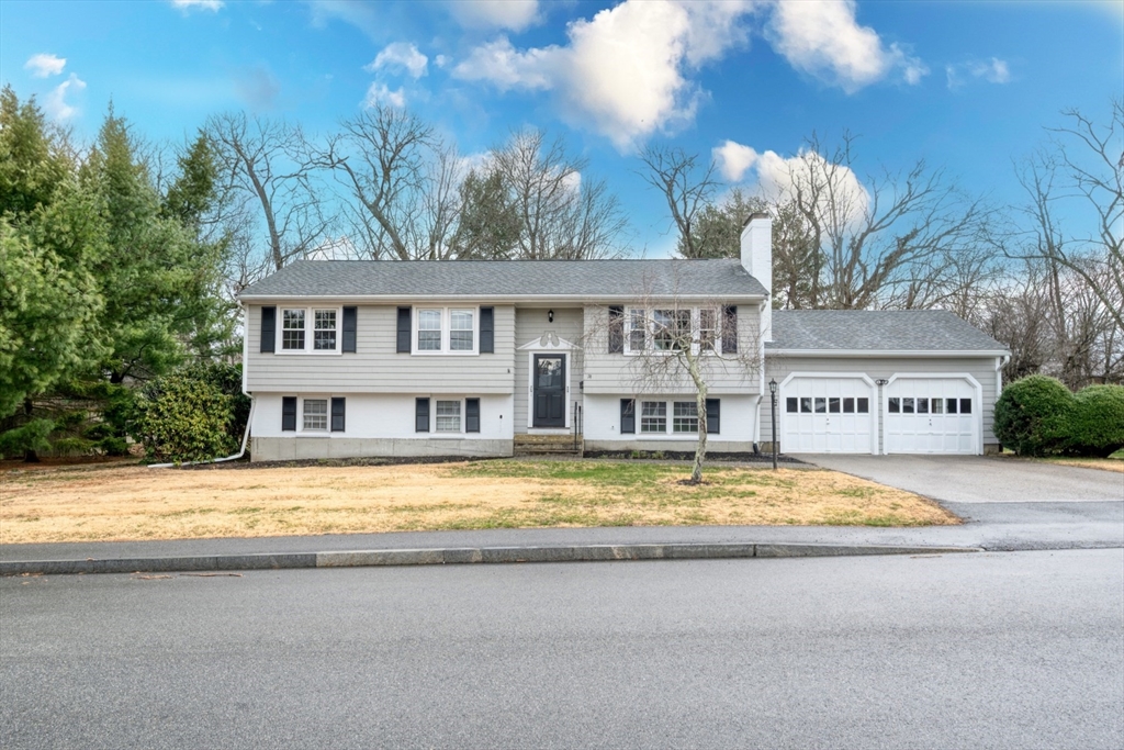 a view of swimming pool with outdoor seating and yard in the back