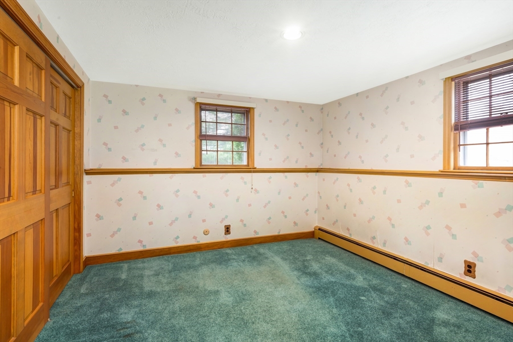 74 Ryder Road Weymouth, MA 02190 - Photo 22 of 33 an empty room with windows