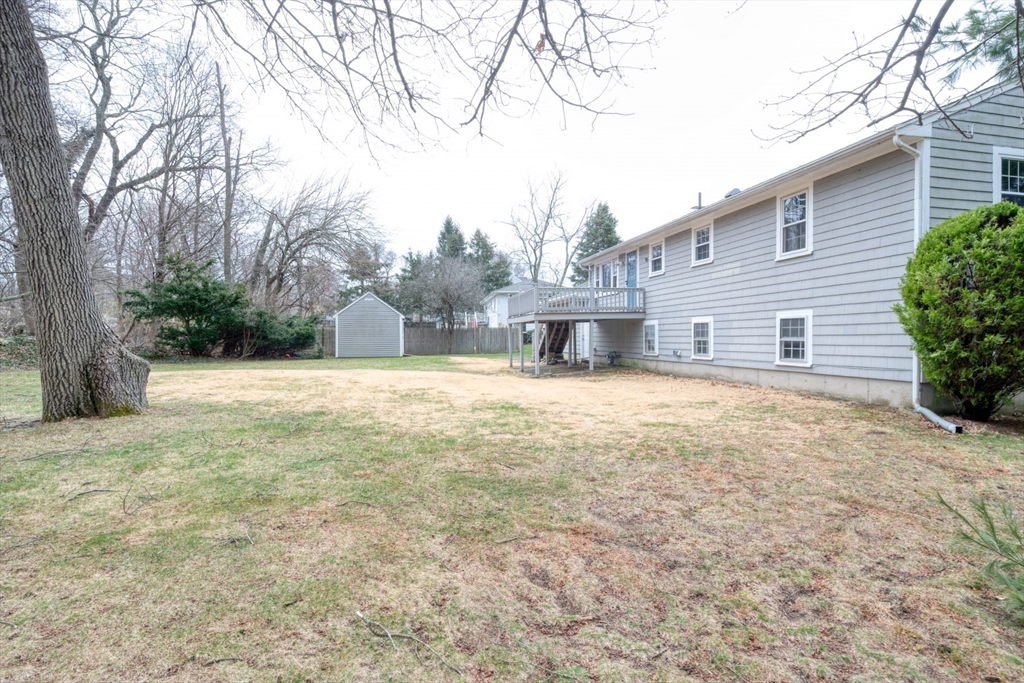 74 Ryder Road Weymouth, MA 02190 - Photo 25 of 33 a view of a house with a yard
