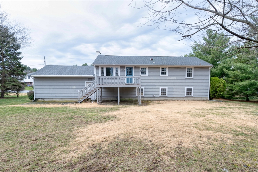 74 Ryder Road Weymouth, MA 02190 - Photo 26 of 33 a view of a house with a yard and large tree