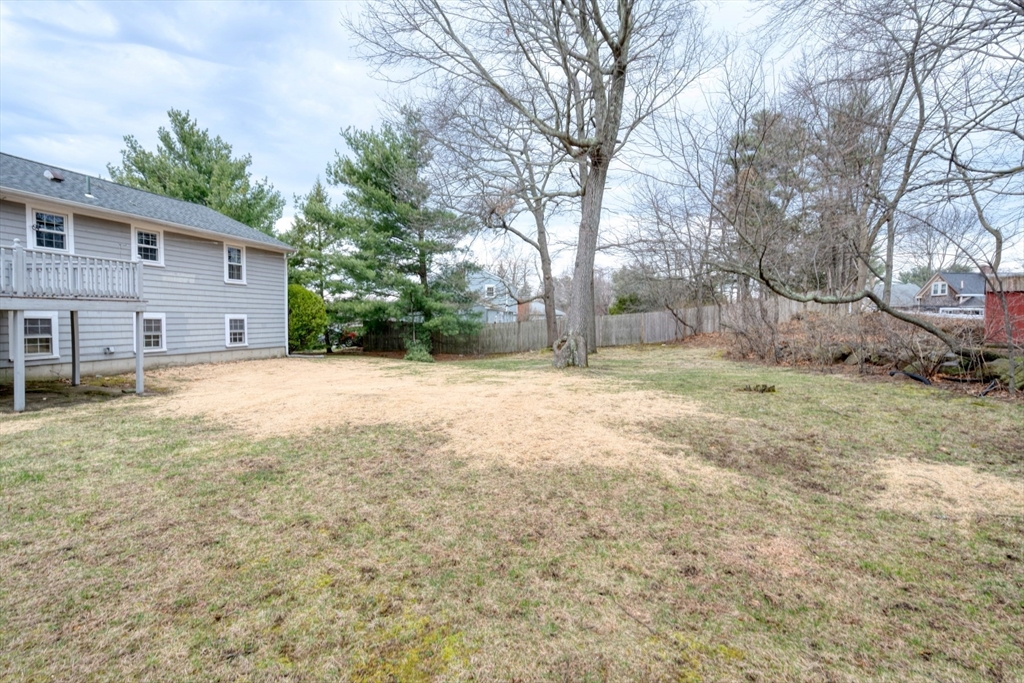 74 Ryder Road Weymouth, MA 02190 - Photo 29 of 33 a view of a yard with a tree