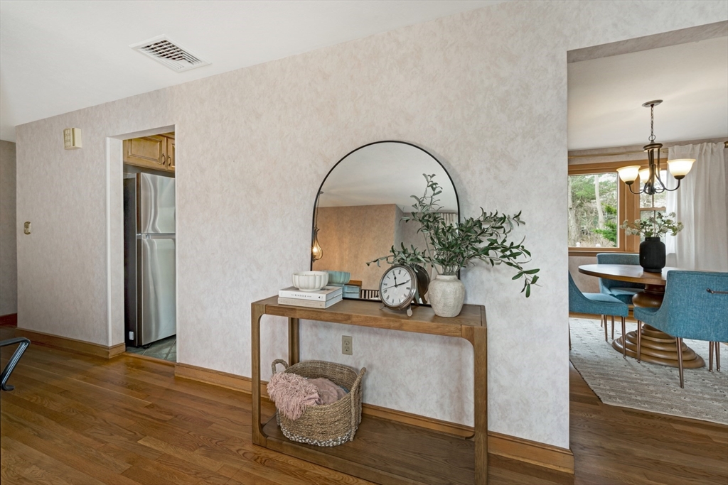 74 Ryder Road Weymouth, MA 02190 - Photo 8 of 33 a living room with furniture and a fireplace