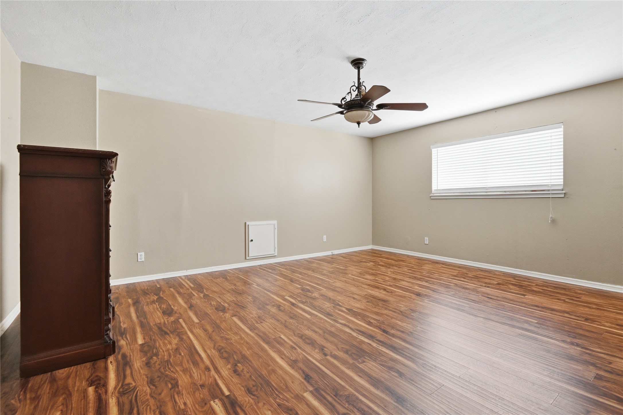1007 Manatee Lane Houston, TX 77090 - Photo 15 of 25 a view of an empty room with wooden floor