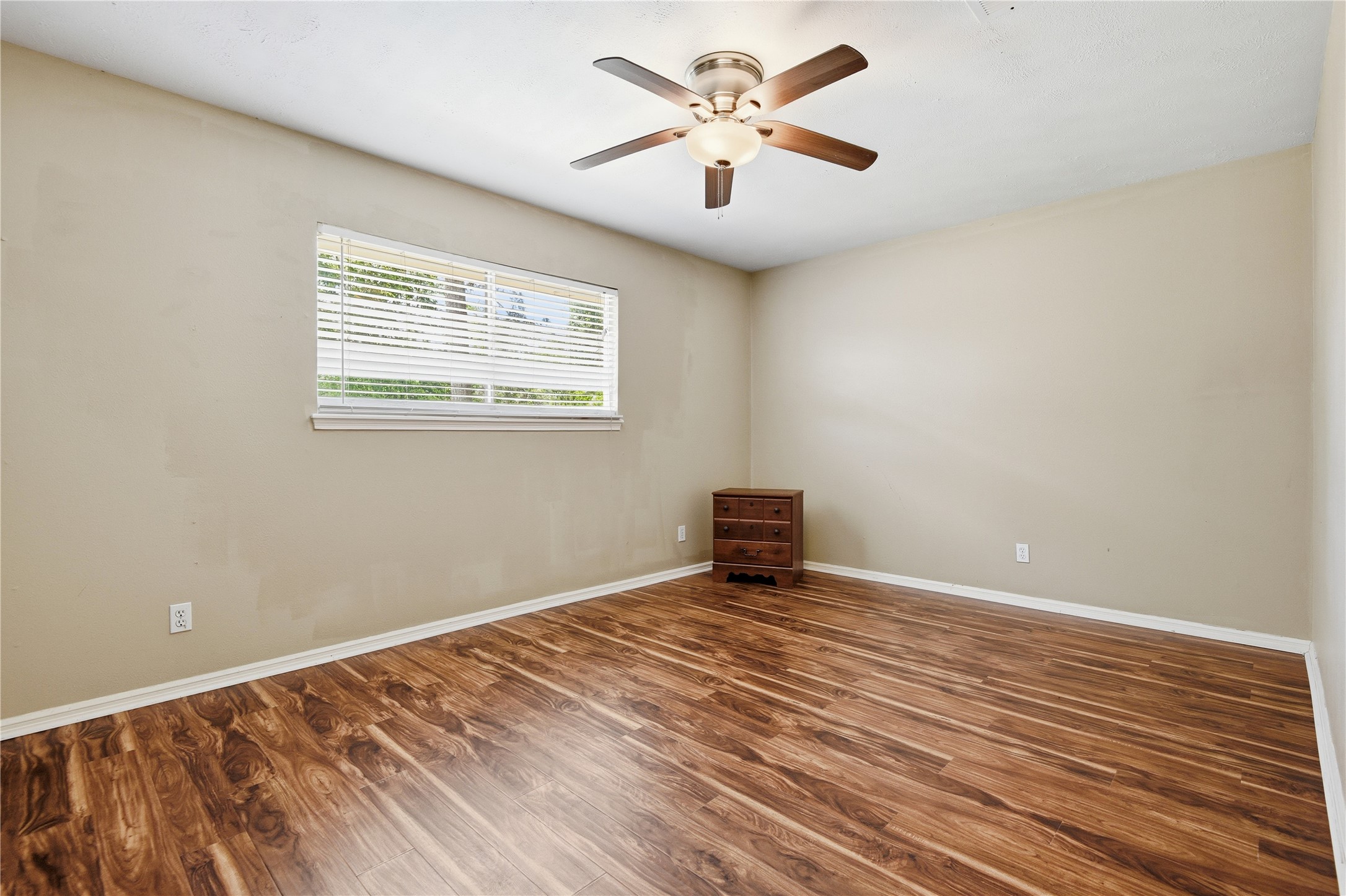 1007 Manatee Lane Houston, TX 77090 - Photo 17 of 25 a view of an empty room with a window