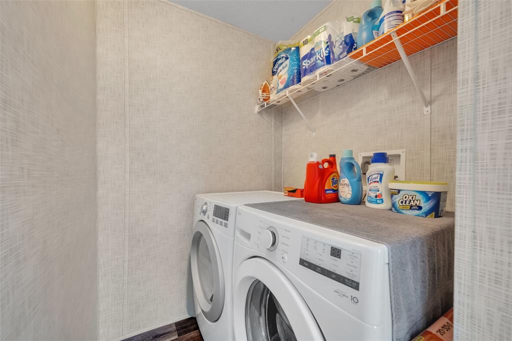 1326 Southwest 69th Road Bushnell, FL 33513 - Photo 19 of 30 a utility room with dryer and washer