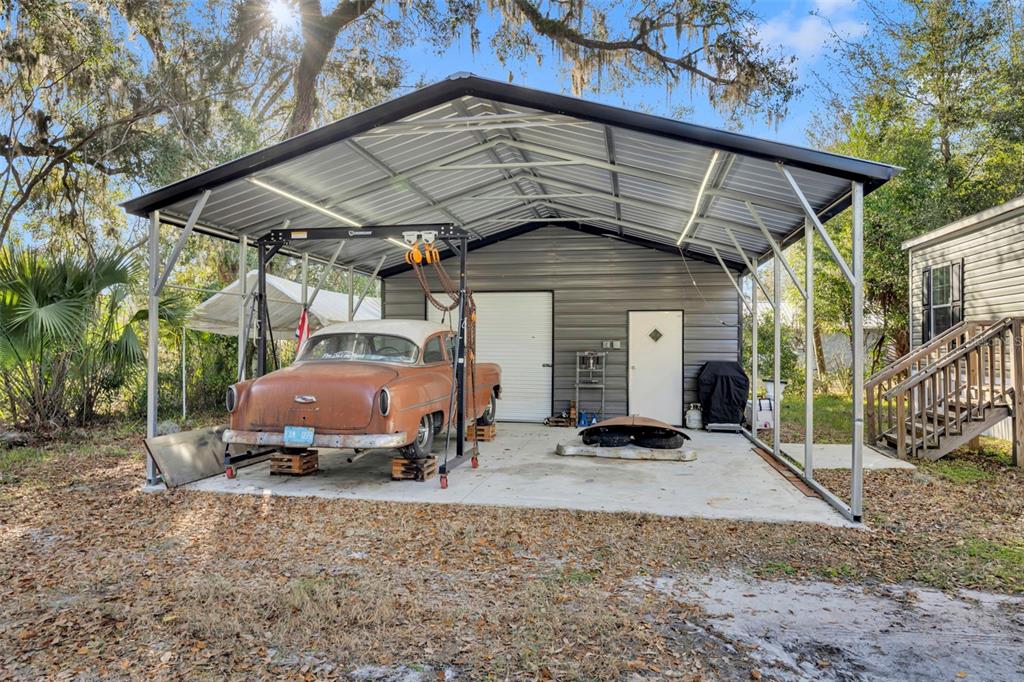 1326 Southwest 69th Road Bushnell, FL 33513 - Photo 23 of 30 a car parked in front of house