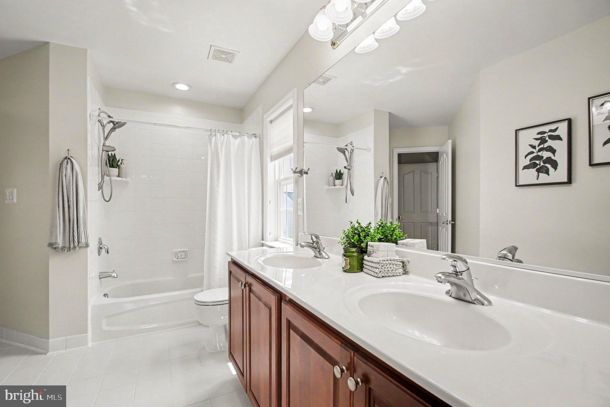 13191 Triple Crown Loop Gainesville, VA 20155 - Photo 31 of 47 Upper bathroom