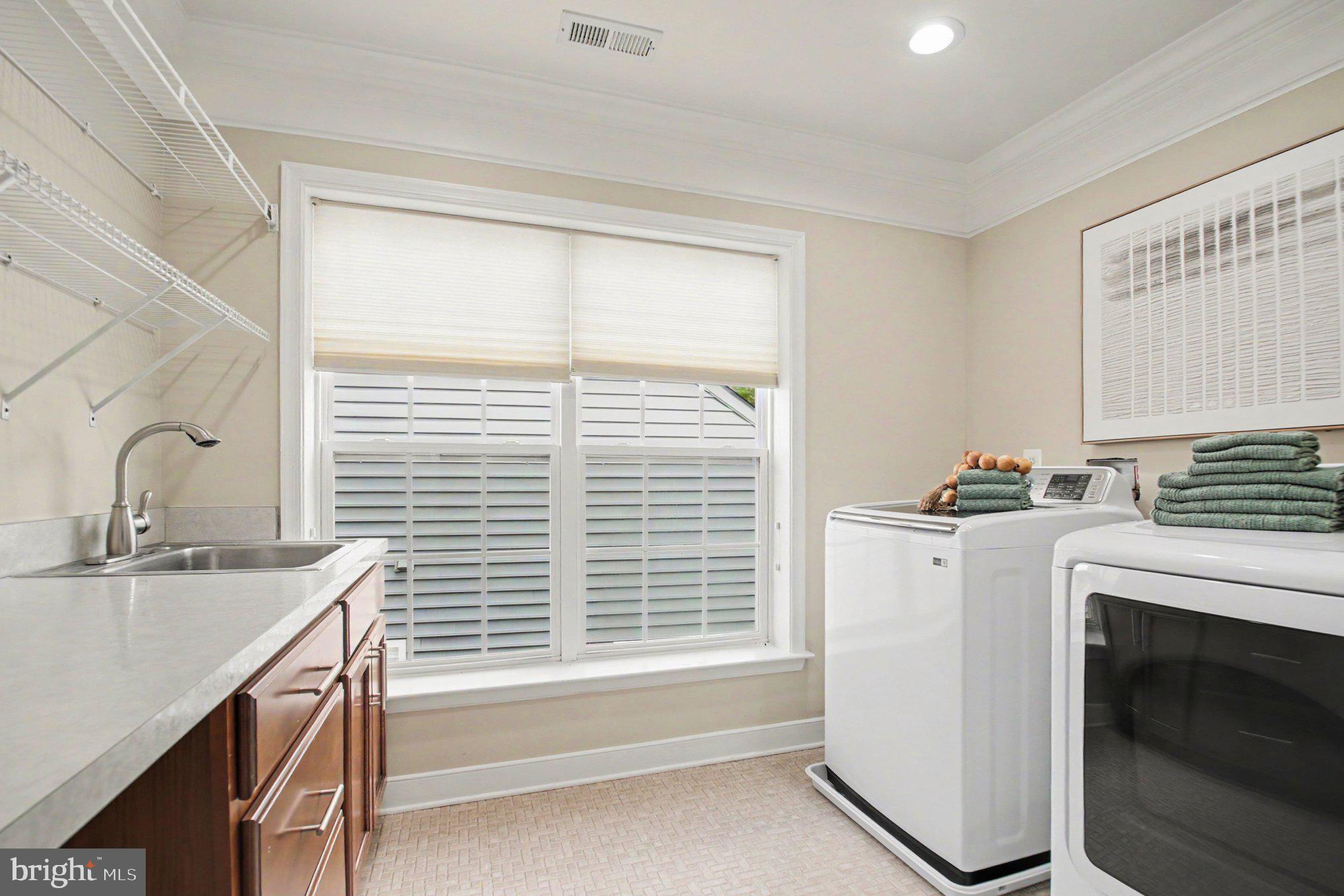 13191 Triple Crown Loop Gainesville, VA 20155 - Photo 32 of 47 Upper level laundry room