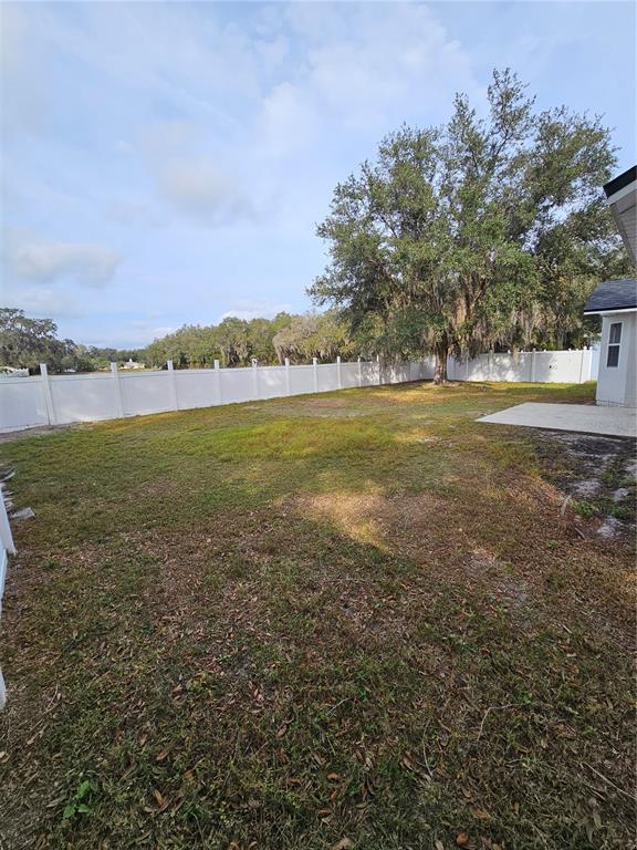 4182 Bedford Road Sanford, FL 32773 - Photo 17 of 18 a view of an lake and a mountain