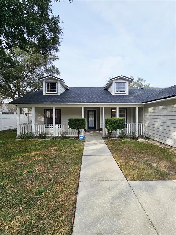 4182 Bedford Road Sanford, FL 32773 - Photo 2 of 18 a front view of a house with a yard