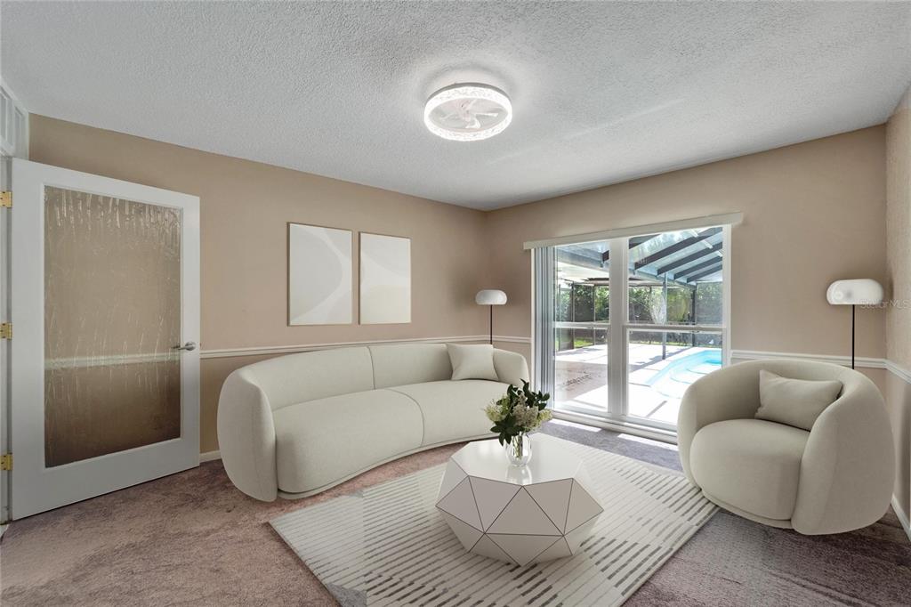 9403 Bellhaven Street Temple Terrace, FL 33637 - Photo 29 of 59 a living room with furniture and a large window