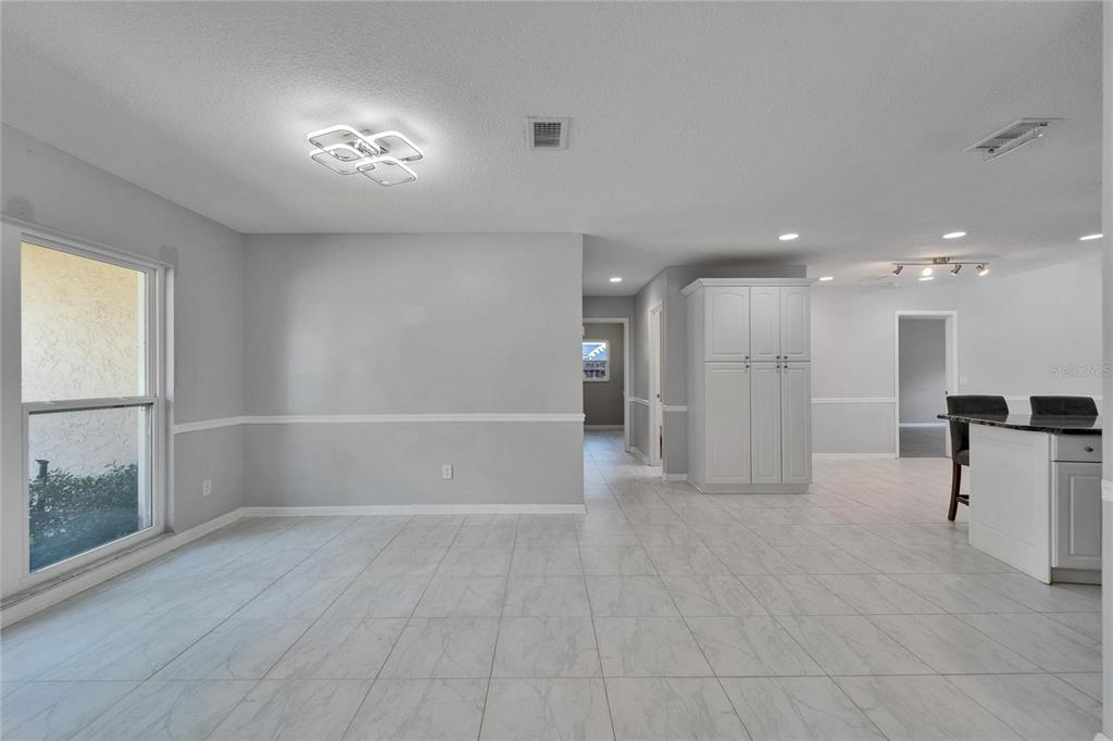 9403 Bellhaven Street Temple Terrace, FL 33637 - Photo 9 of 59 a view of a livingroom with a staircase