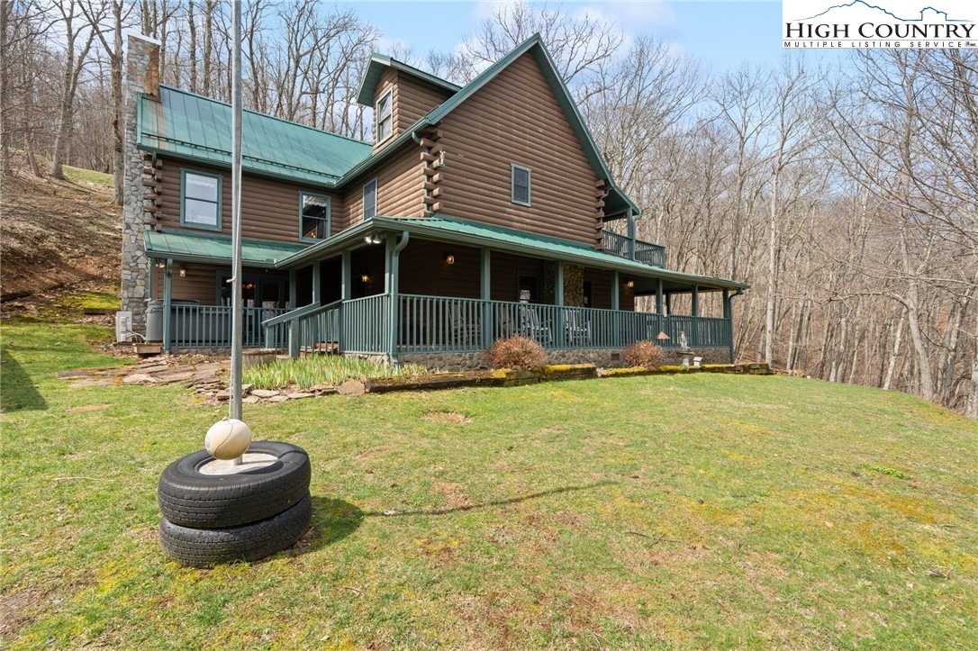 1748 Junaluska Road Boone, NC 28607 - Photo 2 of 37 a front view of a house with a yard