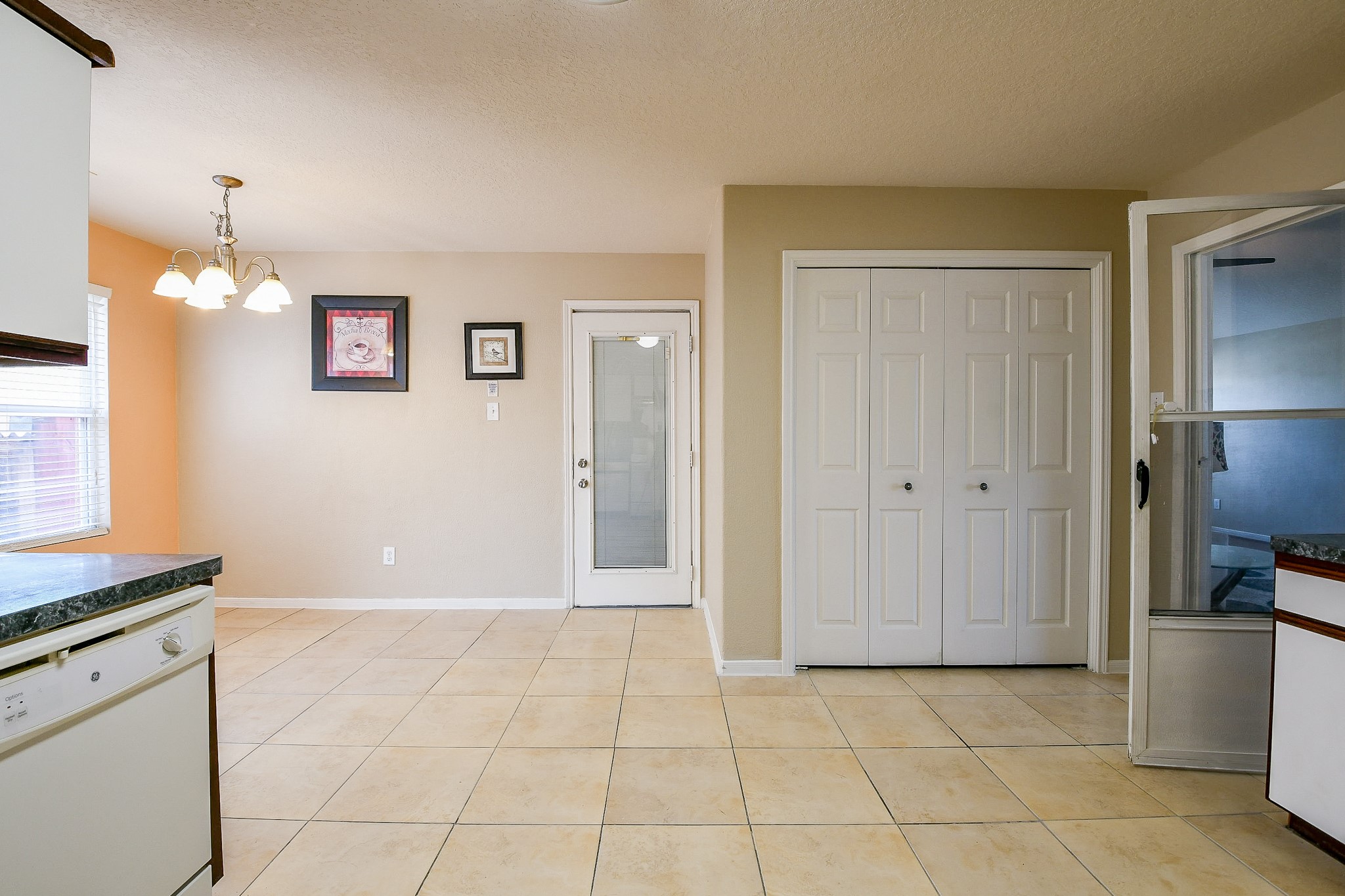5818 Turmeric Drive Baytown, TX 77521 - Photo 22 of 50 a view of a kitchen with a sink and cabinets