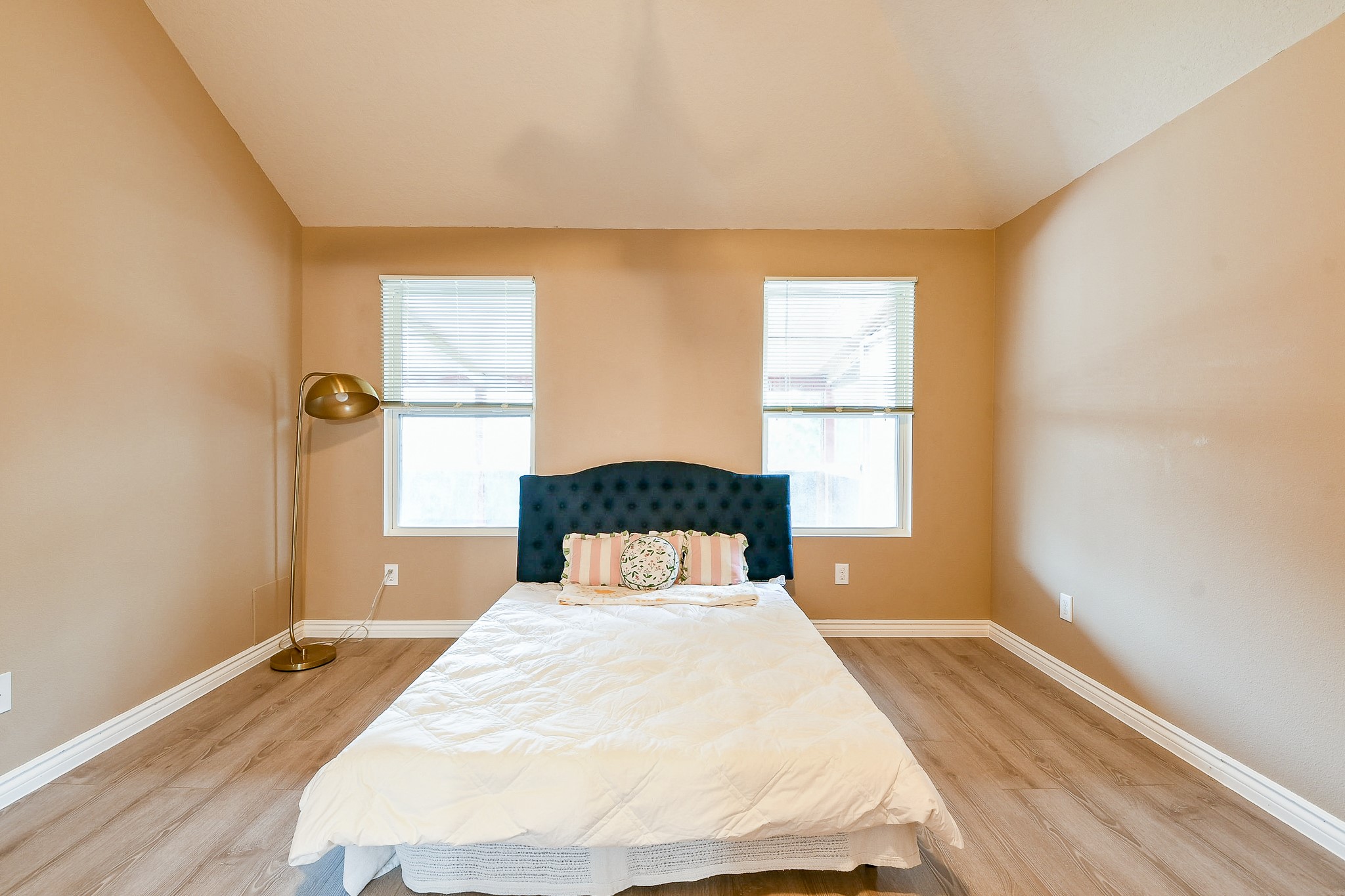 5818 Turmeric Drive Baytown, TX 77521 - Photo 31 of 50 a bedroom with a bed and window