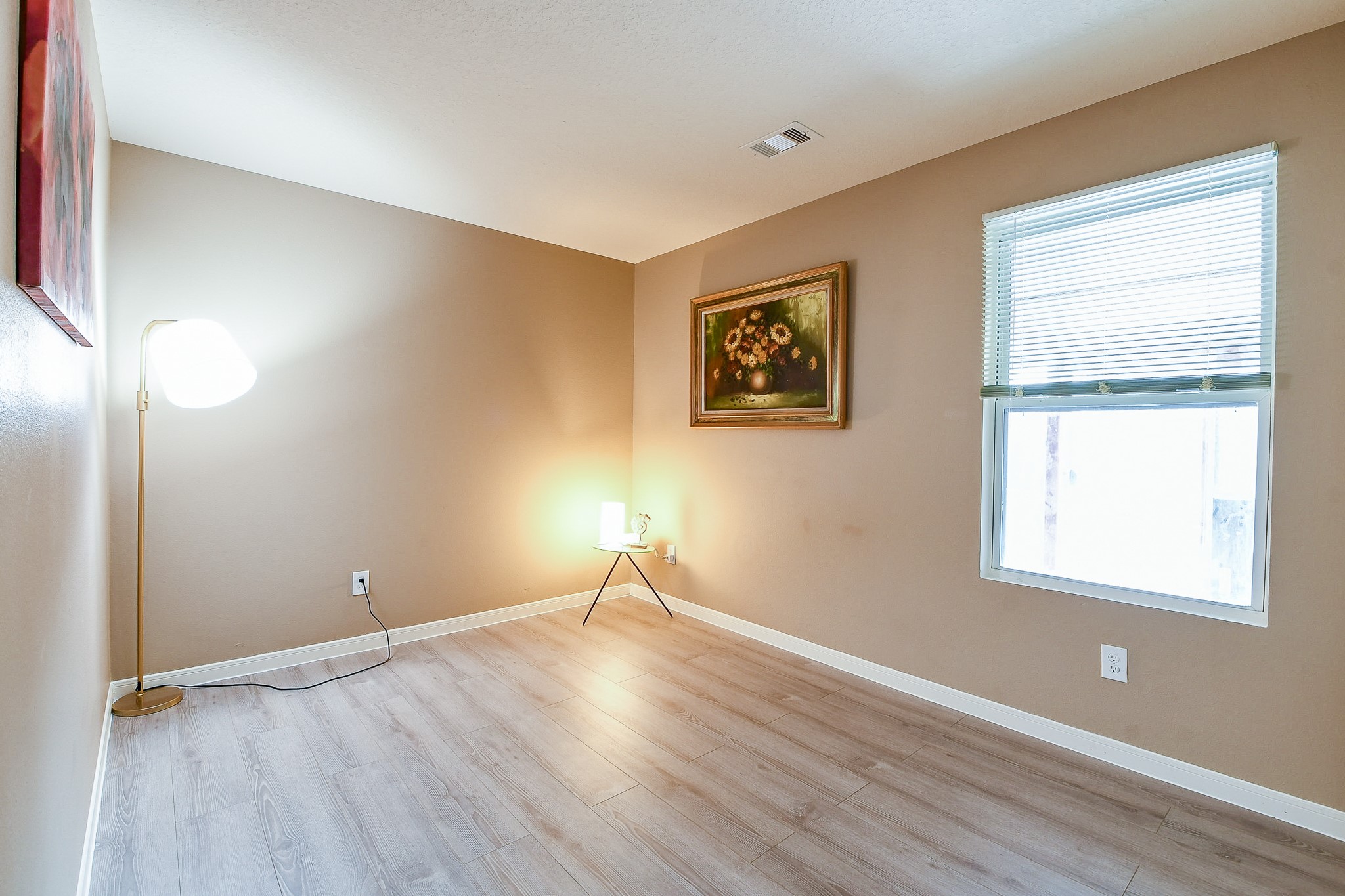 5818 Turmeric Drive Baytown, TX 77521 - Photo 36 of 50 a view of empty room with wooden floor and fan