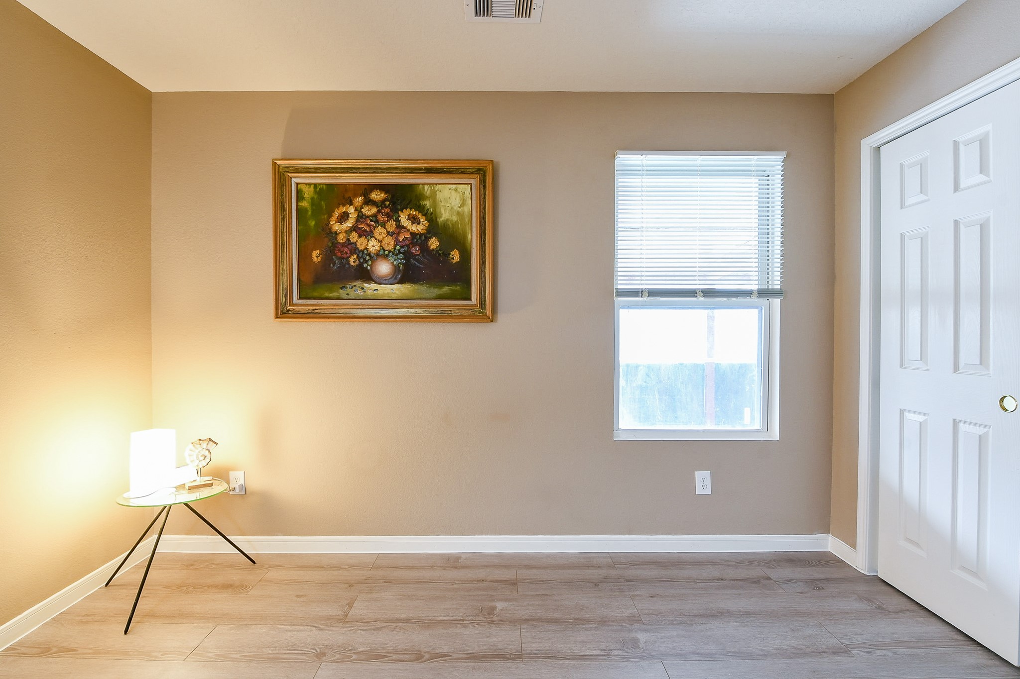 5818 Turmeric Drive Baytown, TX 77521 - Photo 37 of 50 a view of an empty room with wooden floor and a window