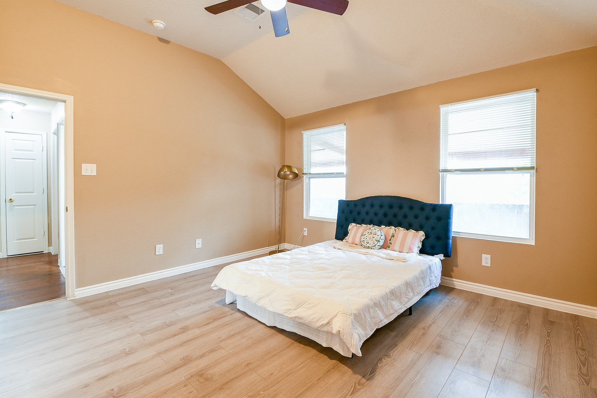 5818 Turmeric Drive Baytown, TX 77521 - Photo 41 of 50 a bedroom with a bed and window