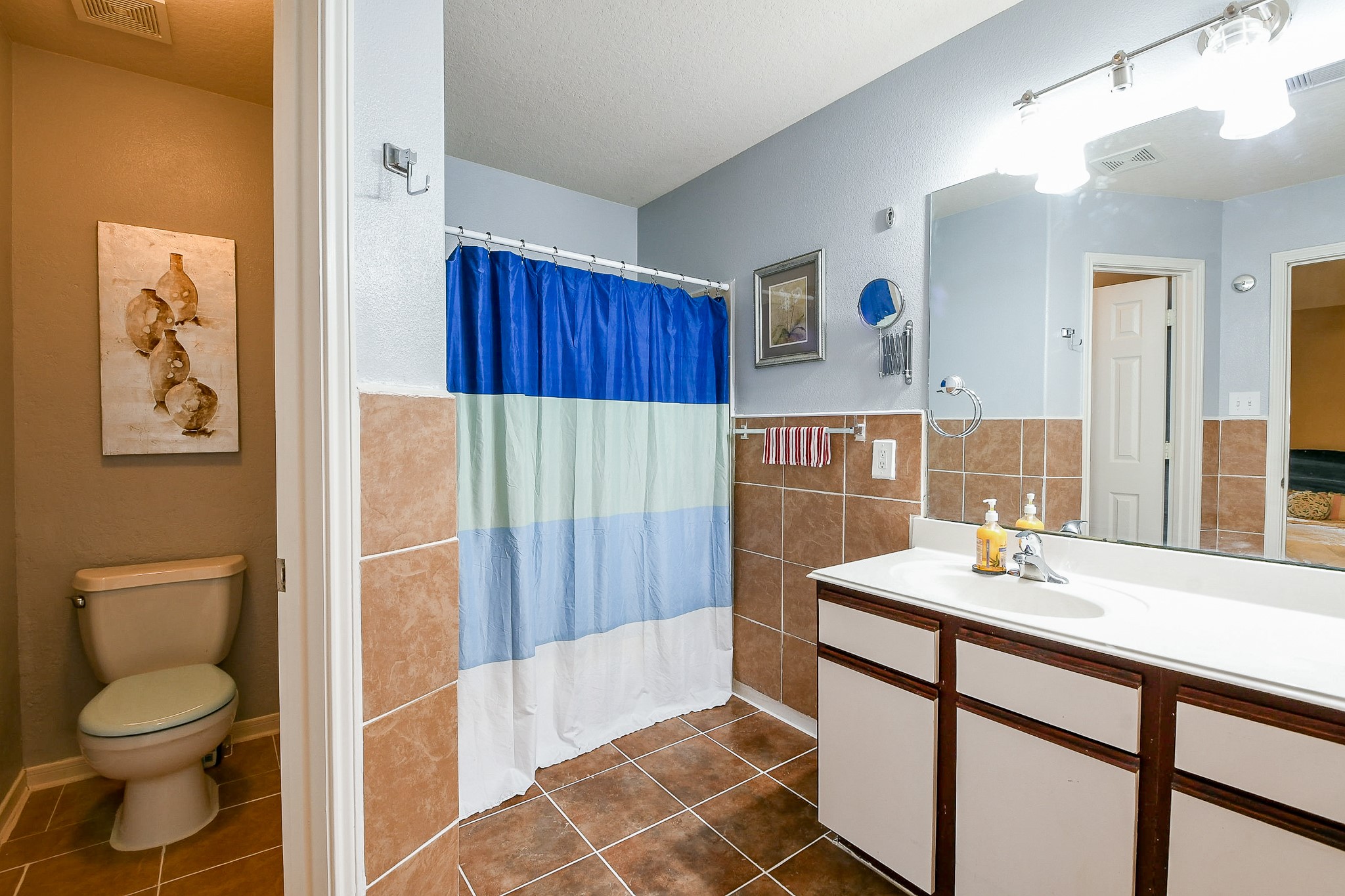 5818 Turmeric Drive Baytown, TX 77521 - Photo 45 of 50 a bathroom with a sink toilet and shower