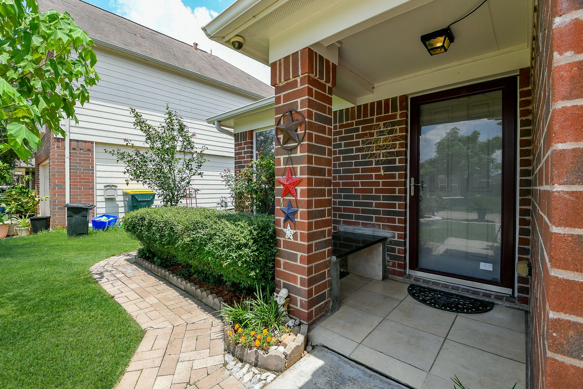 5818 Turmeric Drive Baytown, TX 77521 - Photo 5 of 50 a front view of a house with a garden