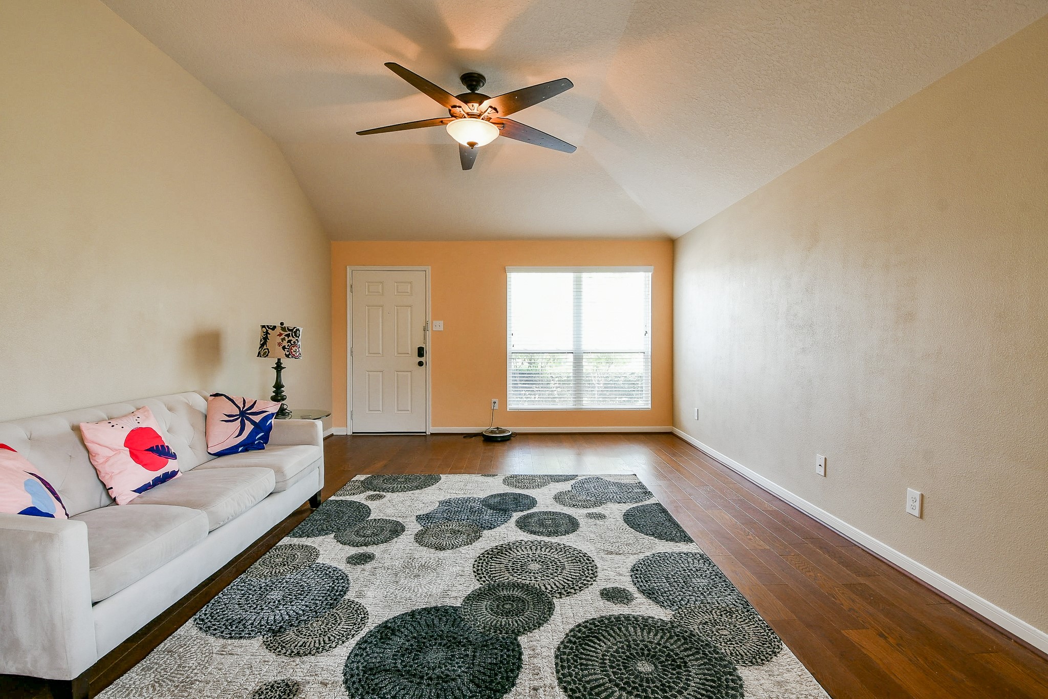 5818 Turmeric Drive Baytown, TX 77521 - Photo 7 of 50 a living room with a couch and a chandelier