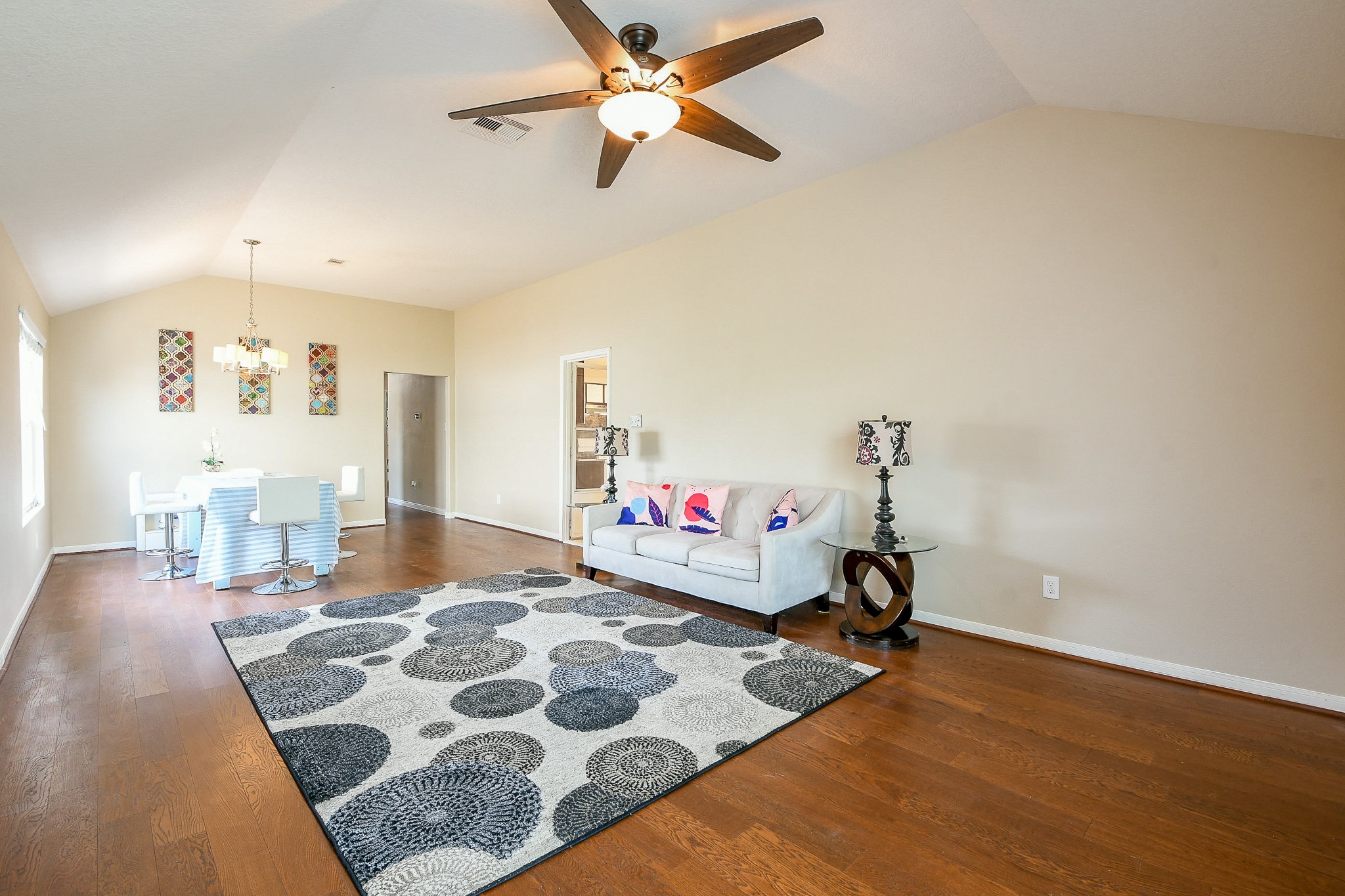 5818 Turmeric Drive Baytown, TX 77521 - Photo 9 of 50 a living room with furniture and a rug