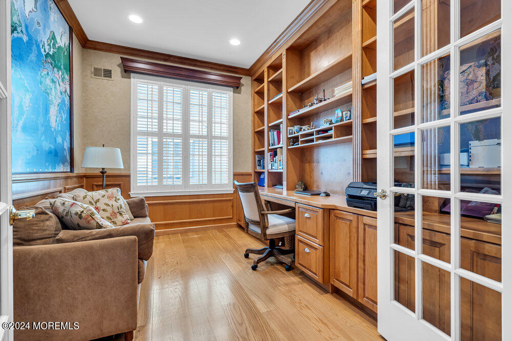 27 Exeter Drive Freehold, NJ 07728 - Photo 18 of 55 a livingroom with workspace and a window