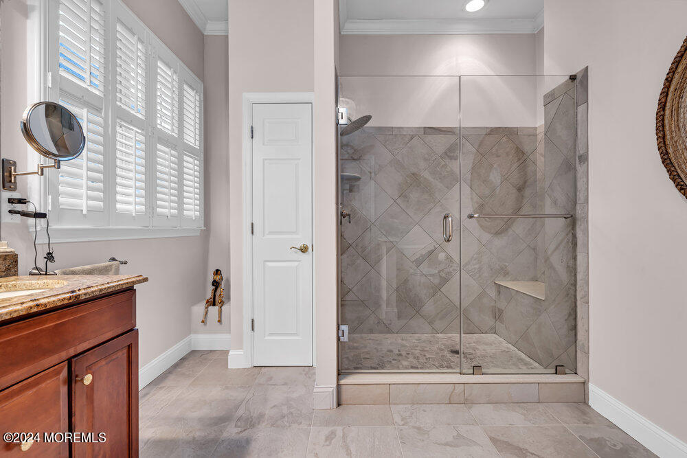 27 Exeter Drive Freehold, NJ 07728 - Photo 28 of 55 a bathroom with a shower and a sink