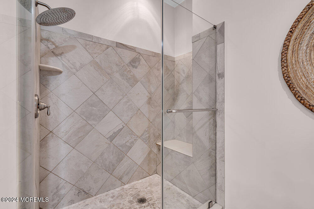 27 Exeter Drive Freehold, NJ 07728 - Photo 29 of 55 a bathroom with a shower