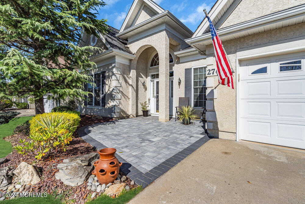 27 Exeter Drive Freehold, NJ 07728 - Photo 3 of 55 a view of a house with a patio