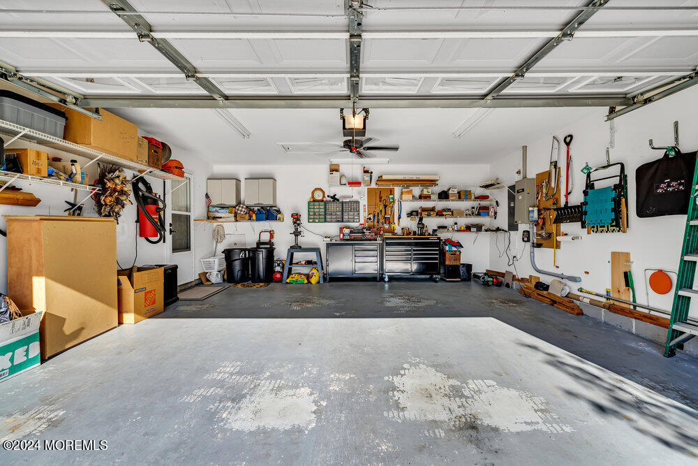 27 Exeter Drive Freehold, NJ 07728 - Photo 37 of 55 a view of a garage with storage and utility