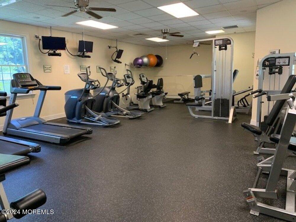 27 Exeter Drive Freehold, NJ 07728 - Photo 49 of 55 a view of a room with gym equipment