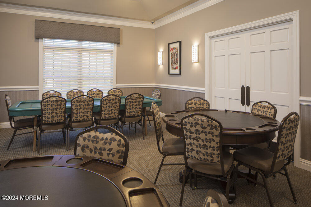 27 Exeter Drive Freehold, NJ 07728 - Photo 50 of 55 a couple of chairs sitting in a room next to a window