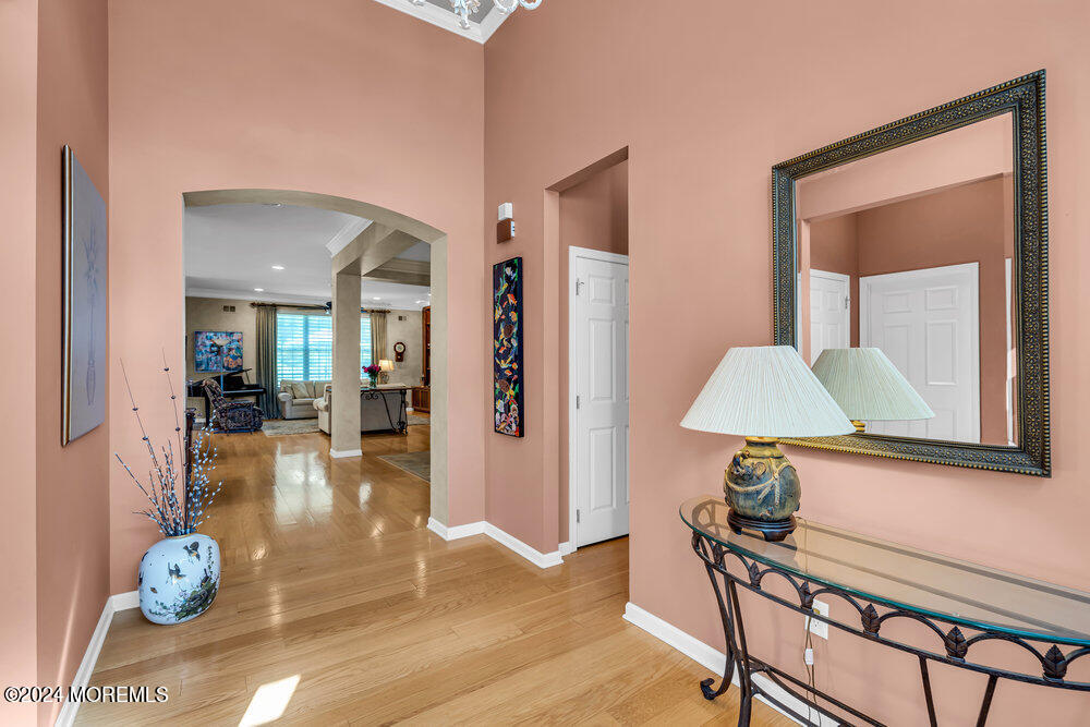 27 Exeter Drive Freehold, NJ 07728 - Photo 5 of 55 a view of a livingroom with furniture and wooden floor