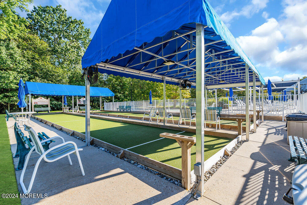 27 Exeter Drive Freehold, NJ 07728 - Photo 53 of 55 a view of a swimming pool with a patio