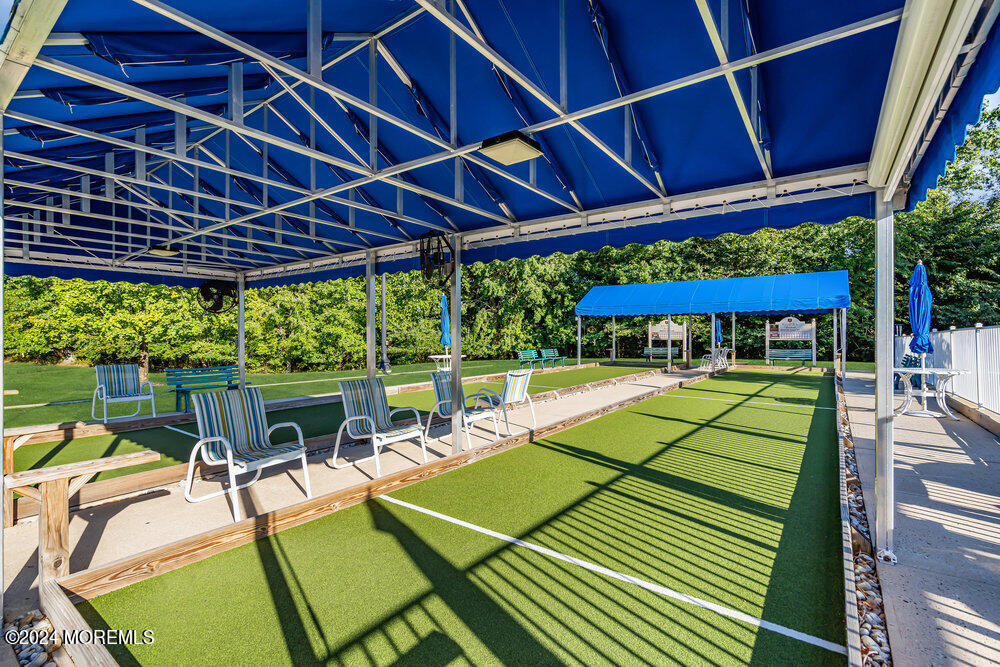 27 Exeter Drive Freehold, NJ 07728 - Photo 54 of 55 a view of a backyard with a patio and a backyard