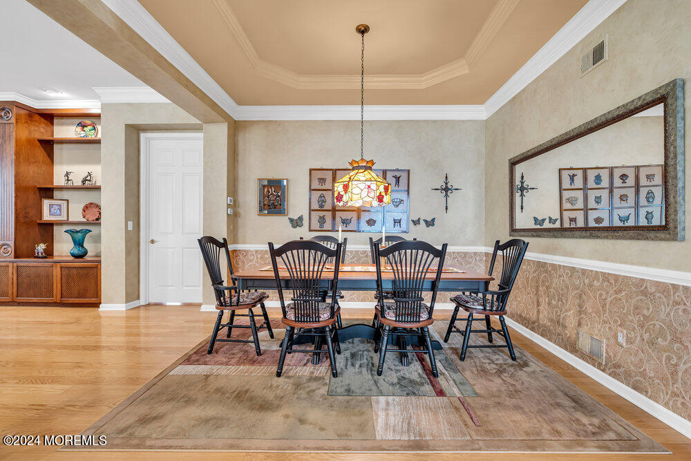 27 Exeter Drive Freehold, NJ 07728 - Photo 10 of 55 a view of a dining room with furniture